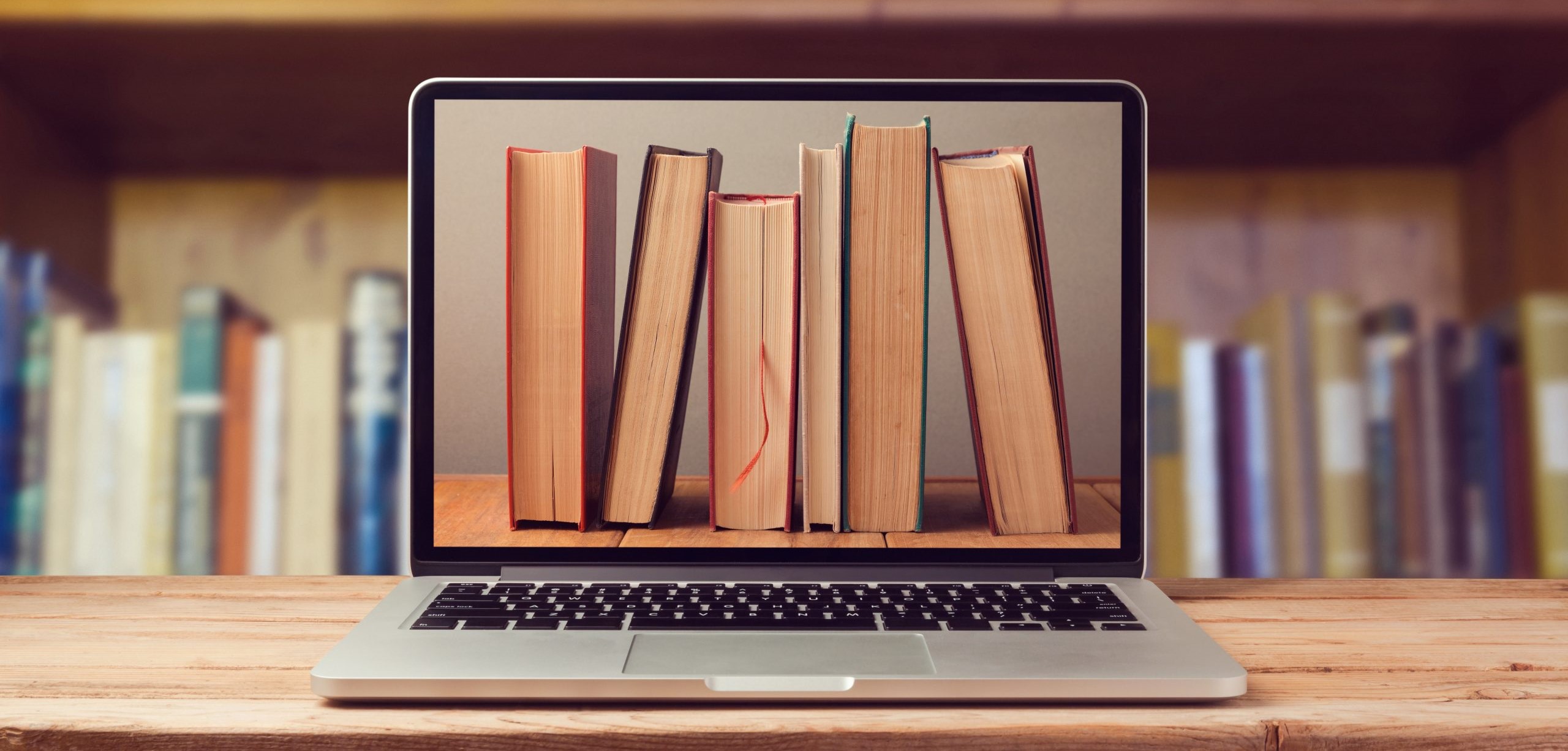 Background Image for Michael Bartos - Vintage Books on a modern laptop screen